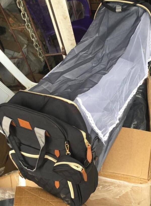 IMG_20260216_074400_645 HIGH QUALITY BABY BED AND NURSING/MATERNITY BACKBAG WITH PURSE, NET & CABLE CHARGER CONNECTOR (NURSING BAG)